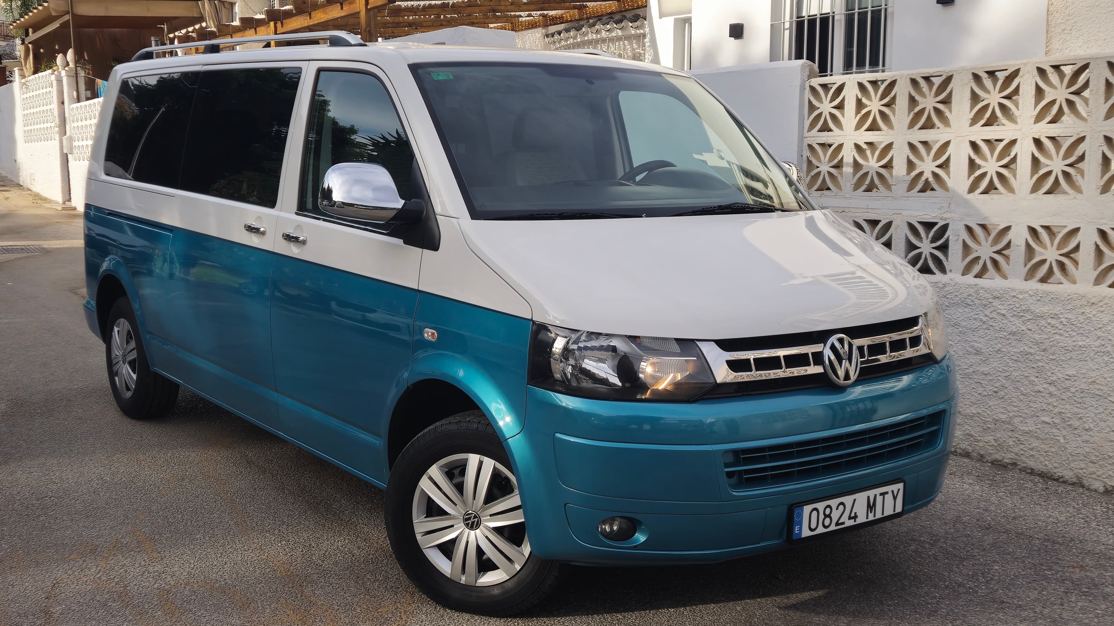 Green and white Volkswagen T6 prepared by AllVanCar